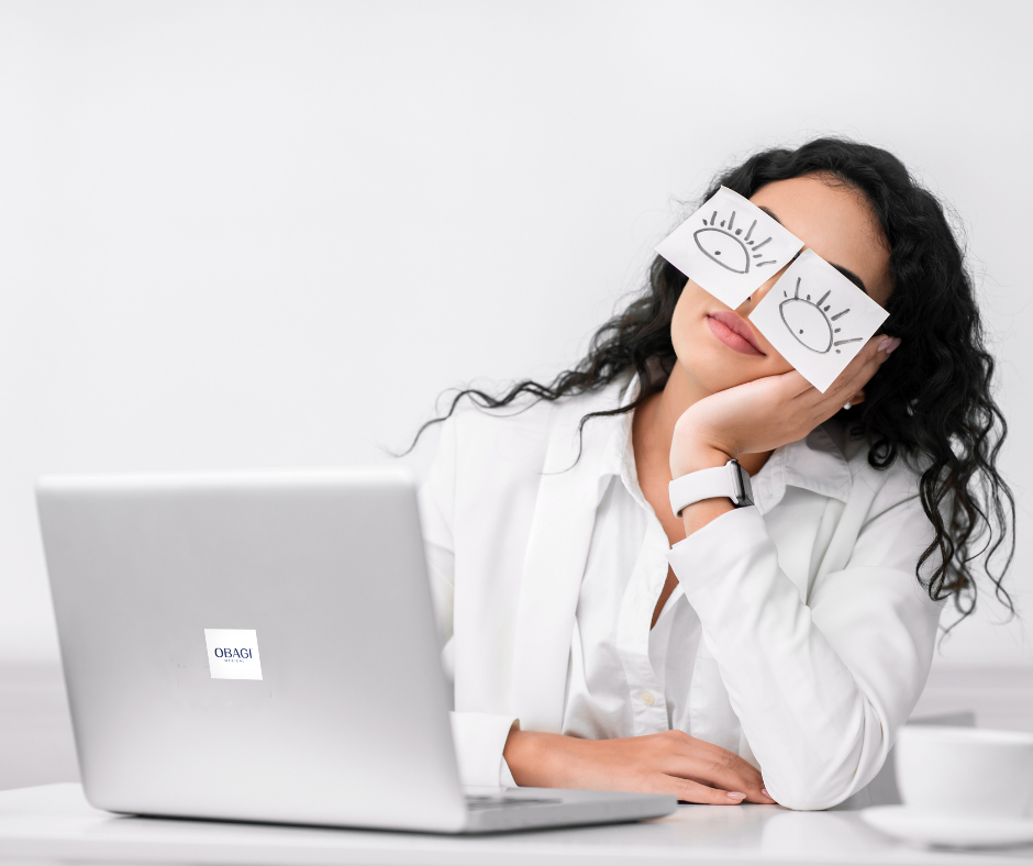 Women with tired eyes infront of laptop obagi medical branded